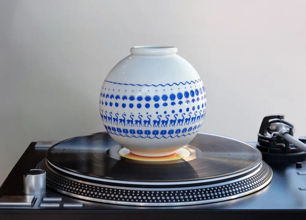 Caravan Moon Pot displayed on a record player